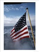 sam-abell-an-american-flag-flutters-from-the-back-of-a-boat-in-neah-bay